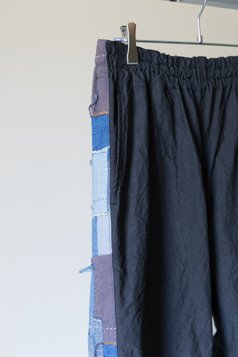 【KUON】"ファナージュコットンナイロントラックパンツ"